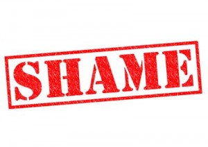 SHAME red Rubber Stamp over a white background.